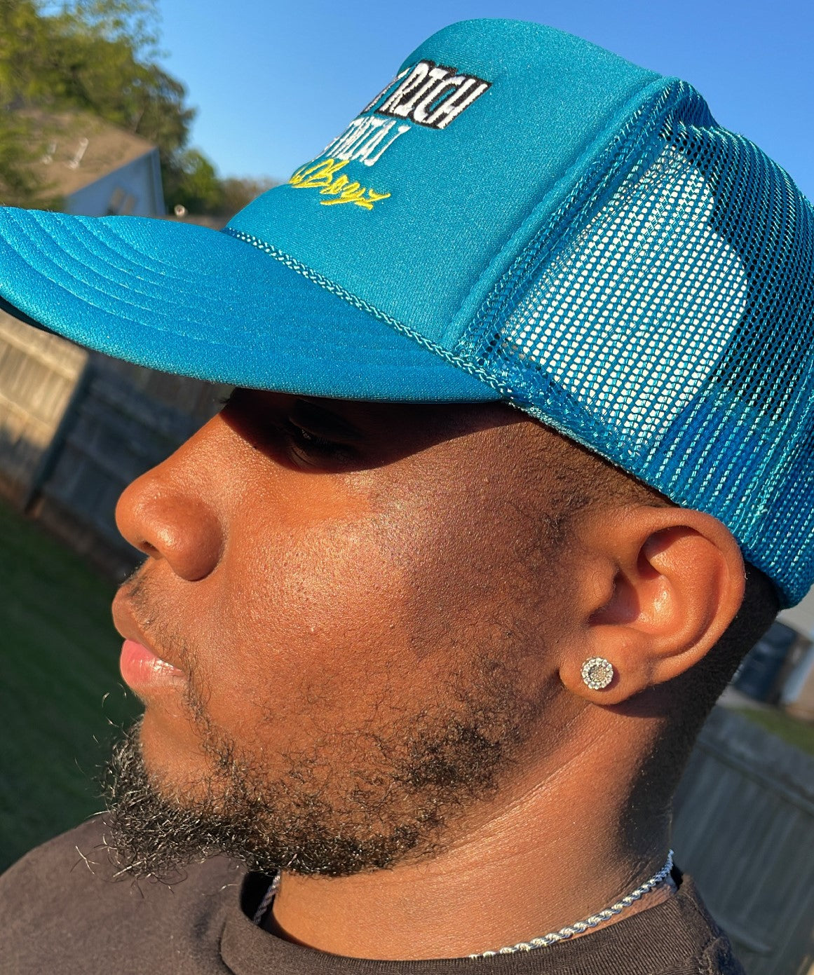 Ain't Rich, Ain't Broke Trucker Hat